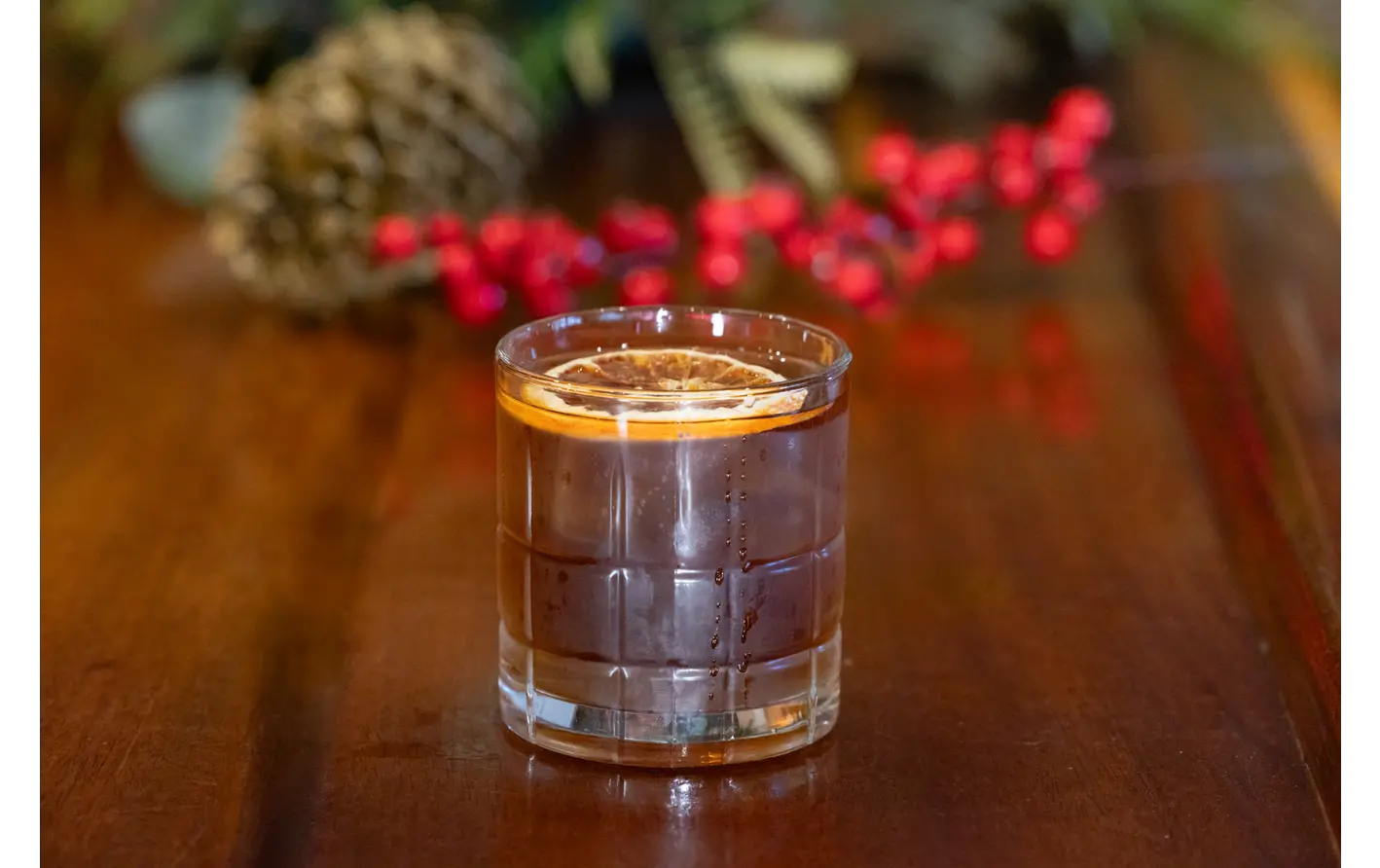 The French Doctor cocktail with Grand Marnier with a desiccated orange garnish. Dedicated to Maurice Guillemette. Recipe by Ethan Guillemette